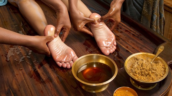 traditional indian ayurvedic oil foot massage